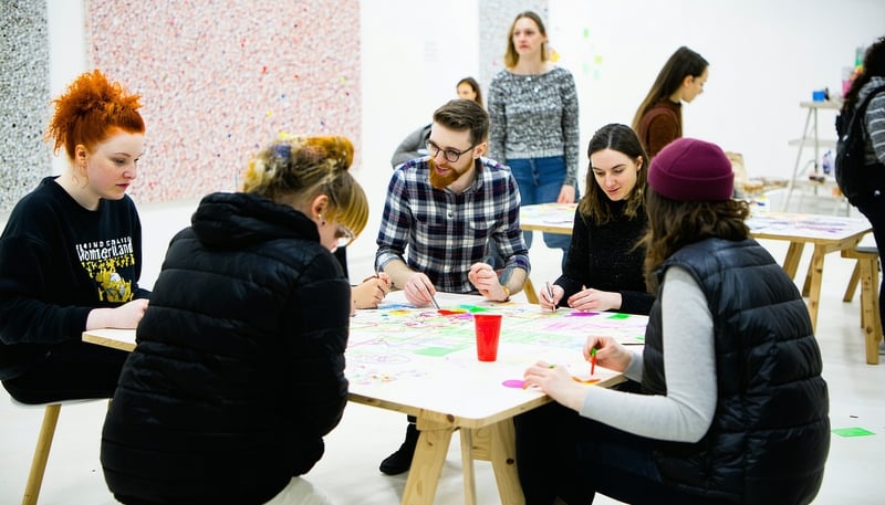 Community members participating in a collective workshop at Wonderland